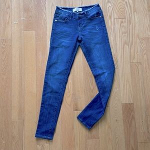 Jeans with a Frayed Waistband